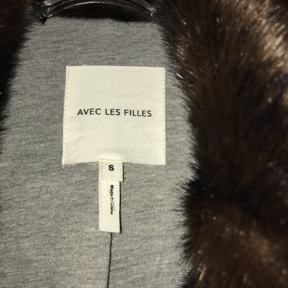 Avec les filles faux fur mink 3/4 length coat.